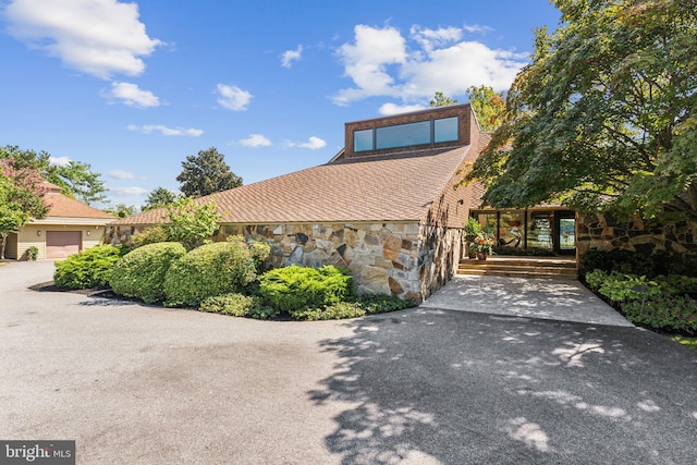 view of front of home featuring a garage