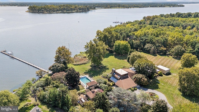 bird's eye view with a water view