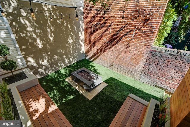 exterior space featuring a fire pit