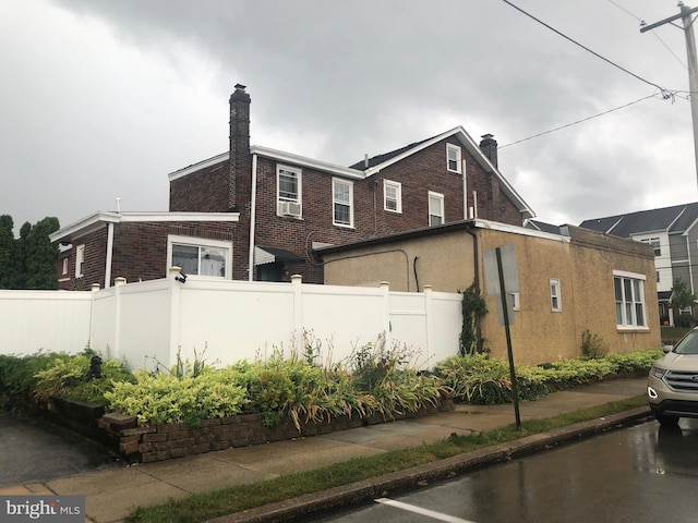 view of property exterior featuring cooling unit