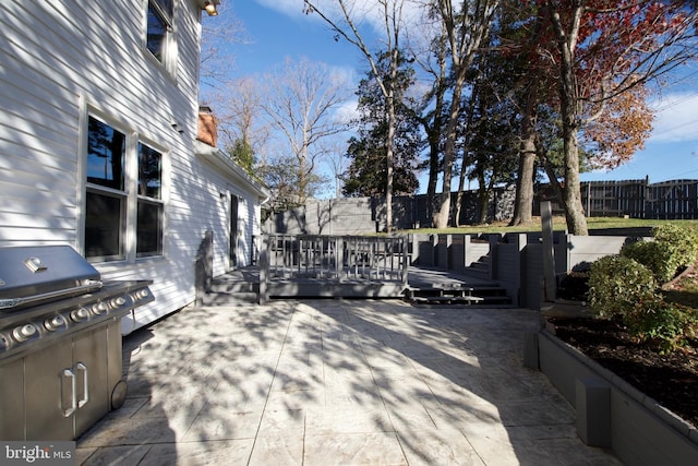 view of patio with a deck