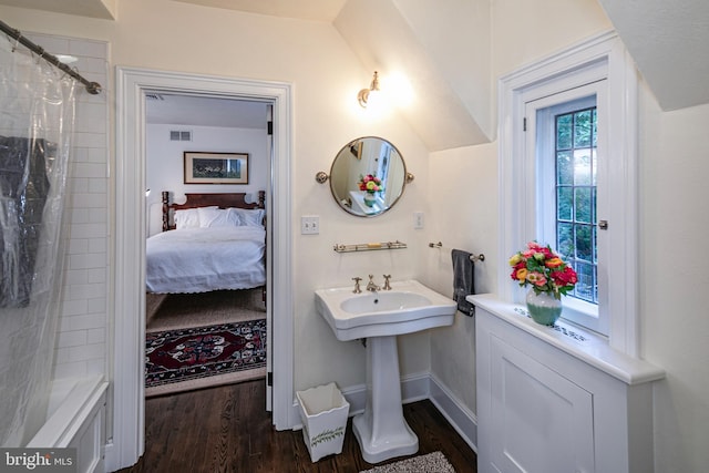 94 N Rd, Princeton, NJ 08540 - bathroom with baseboards, wood finished floors, curtained shower, and visible vents