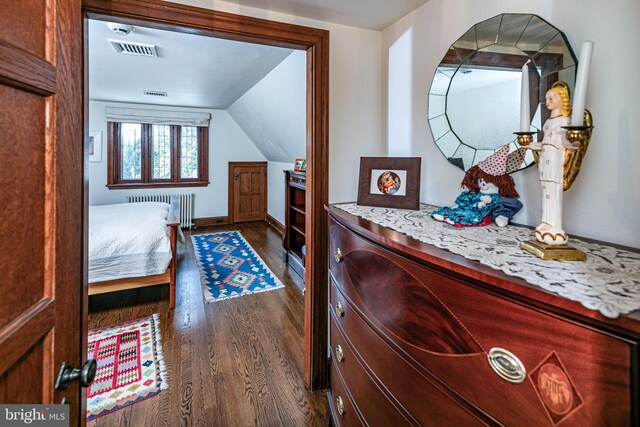 94 N Rd, Princeton, NJ 08540 - bedroom with dark wood finished floors, vaulted ceiling, radiator heating unit, and visible vents