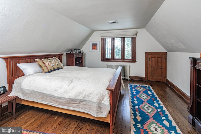 94 N Rd, Princeton, NJ 08540 - bedroom featuring radiator, dark wood finished floors, lofted ceiling, visible vents, and baseboards