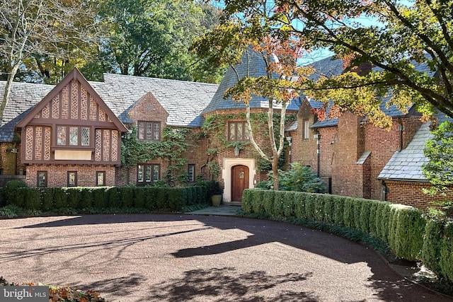 view of tudor-style house