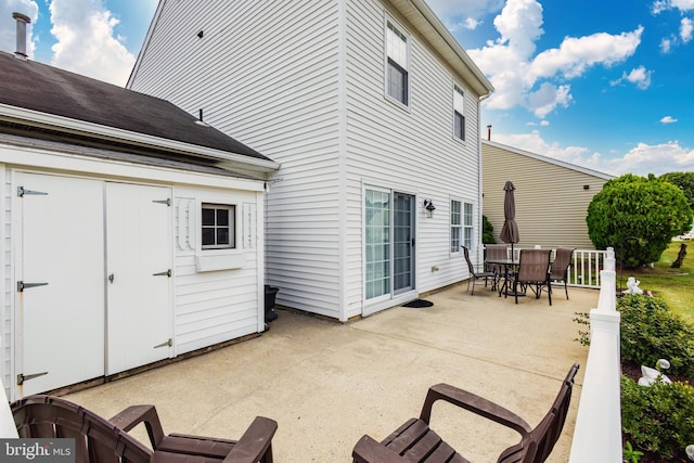 back of house featuring a patio area