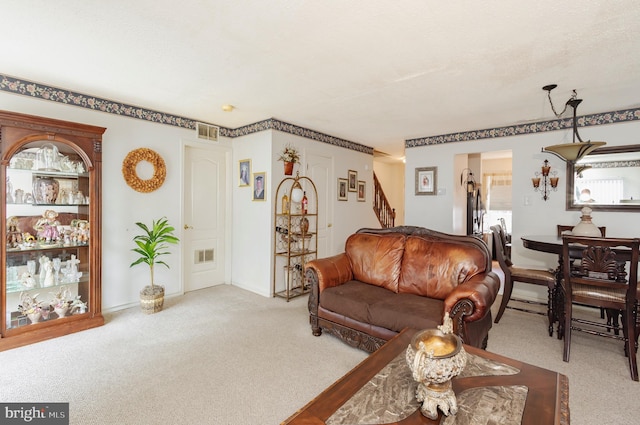 living room featuring light carpet