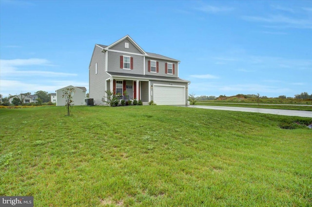 view of front of home featuring central air condition unit, a front lawn, and a garage