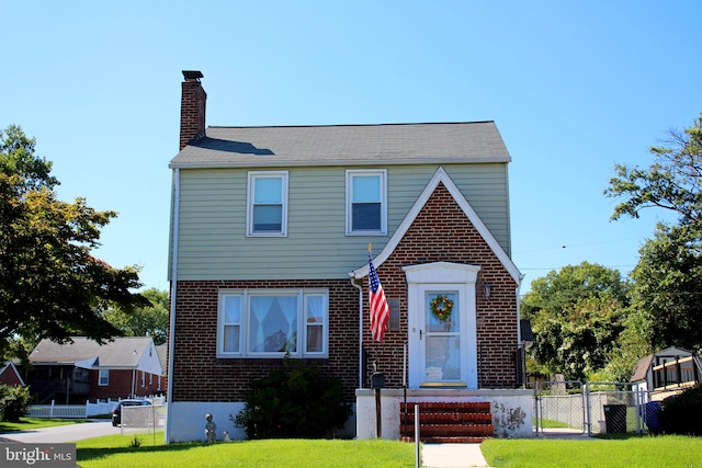 view of front of house with a front yard