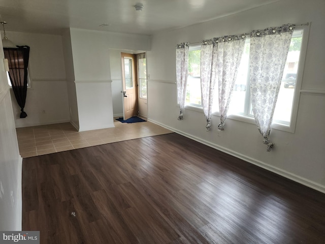 spare room featuring hardwood / wood-style flooring