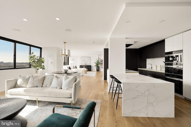 living room featuring light wood-type flooring