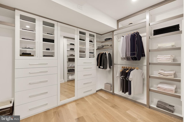 walk in closet featuring light wood-type flooring