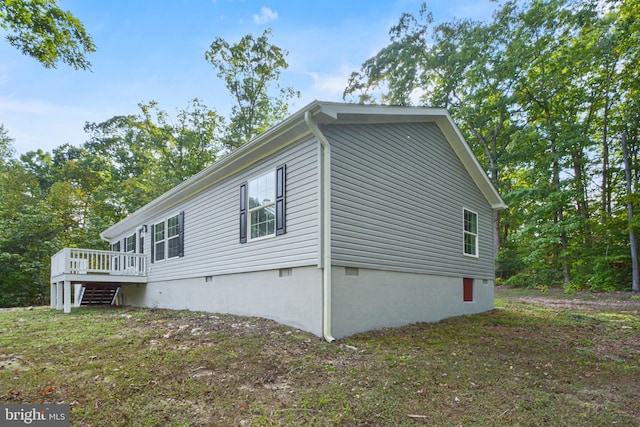 view of property exterior featuring a deck