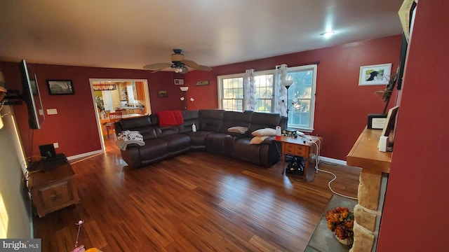 living room with hardwood / wood-style flooring and ceiling fan