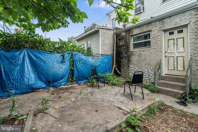 view of patio with cooling unit