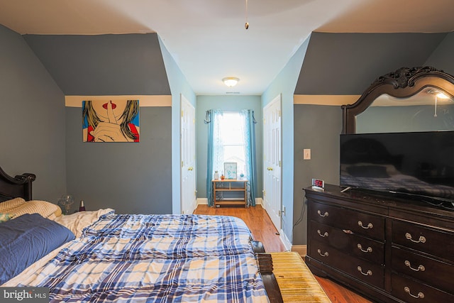 bedroom with light hardwood / wood-style flooring