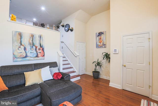 living room featuring dark wood-type flooring