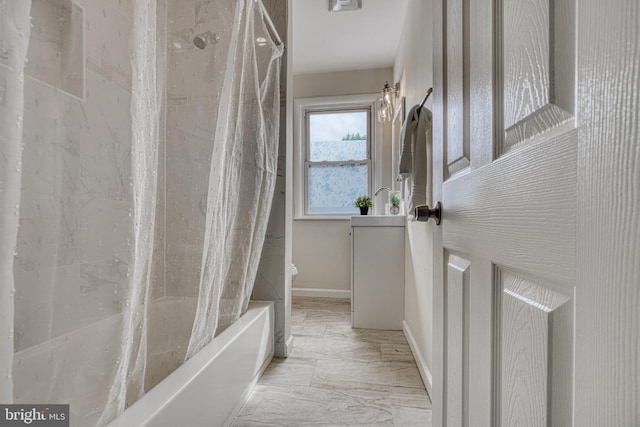 bathroom featuring shower / bathtub combination with curtain