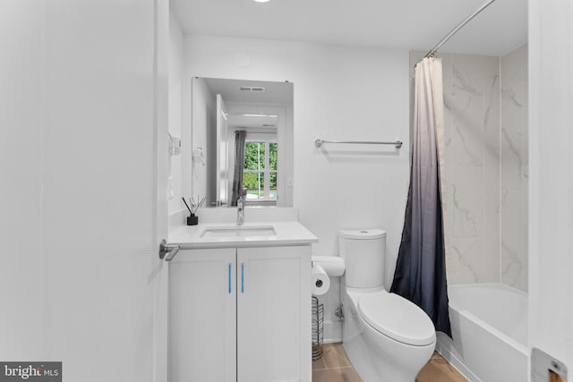 full bathroom featuring vanity, toilet, and shower / bath combo