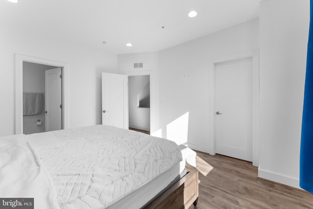 bedroom featuring light wood-type flooring