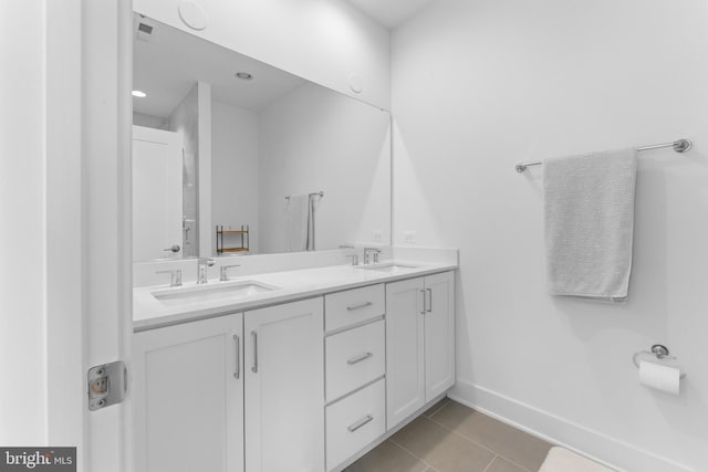 bathroom featuring tile patterned floors and vanity