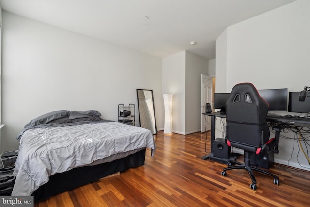 bedroom featuring hardwood / wood-style flooring