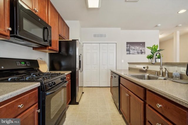 kitchen featuring sink and black appliances