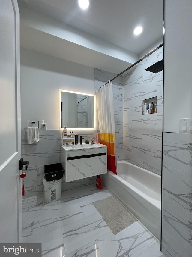 bathroom with shower / bath combination with curtain and vanity