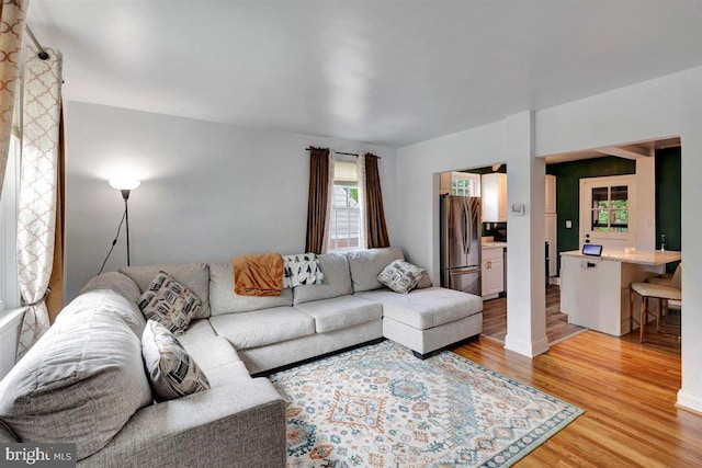 living room featuring light wood-type flooring