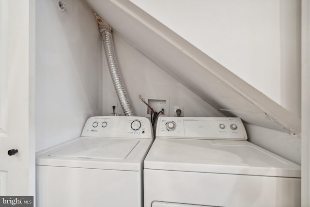 laundry room featuring separate washer and dryer