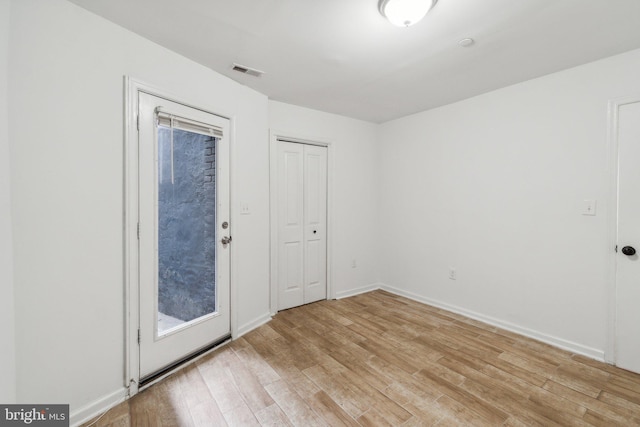 foyer entrance featuring light hardwood / wood-style floors