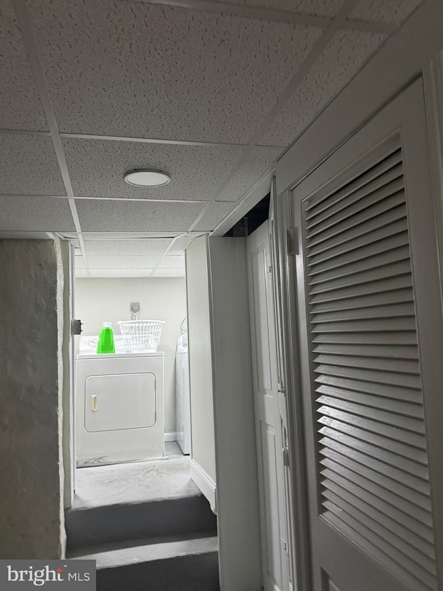 clothes washing area featuring washing machine and clothes dryer