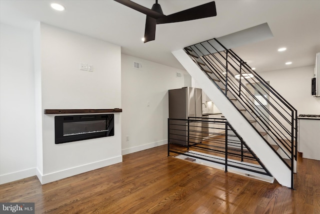 staircase featuring hardwood / wood-style flooring