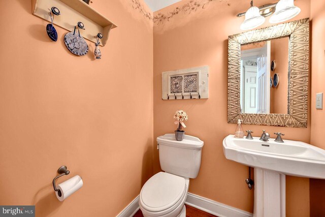 bathroom featuring toilet