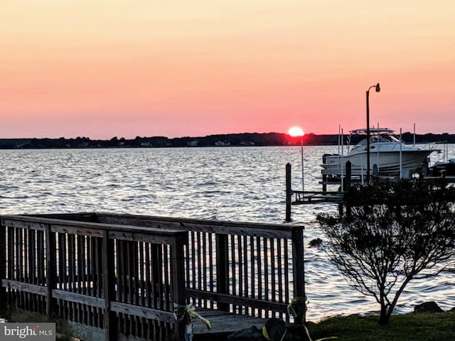 dock area featuring a water view