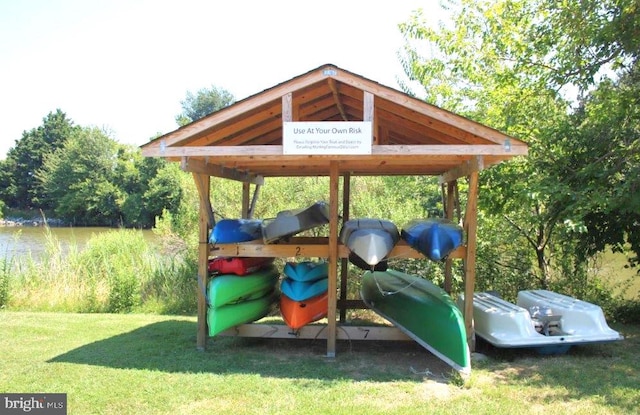 view of playground with a lawn