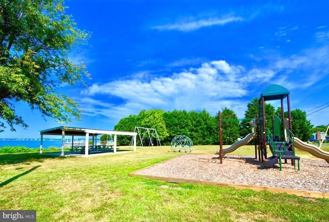 view of jungle gym with a yard