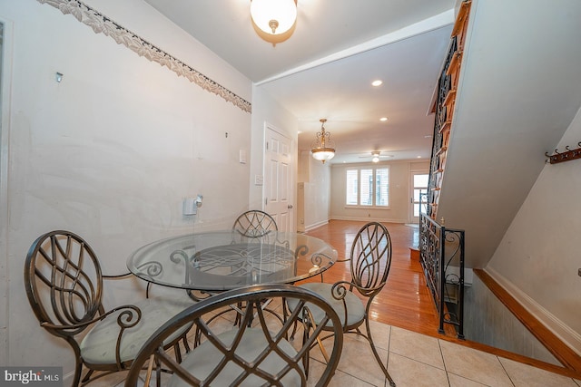 dining space with light hardwood / wood-style floors