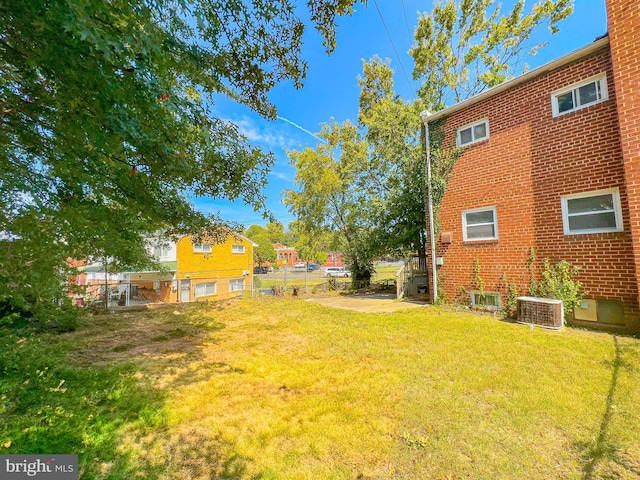 view of yard featuring central AC