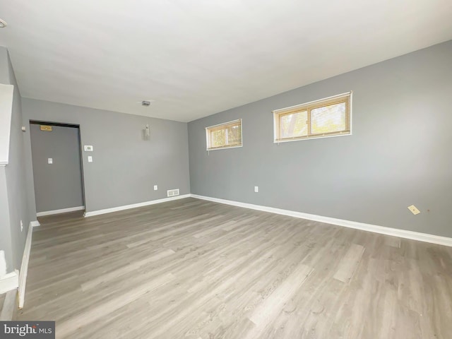 unfurnished room featuring light wood-type flooring