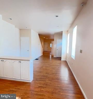 empty room featuring hardwood / wood-style floors