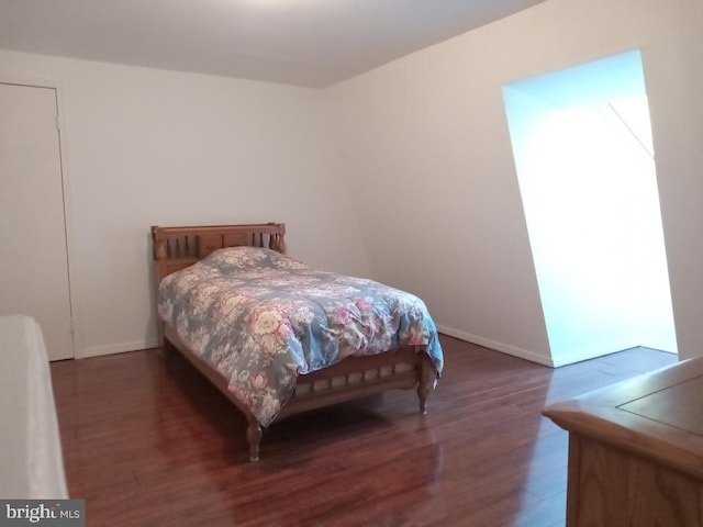 bedroom featuring dark hardwood / wood-style floors