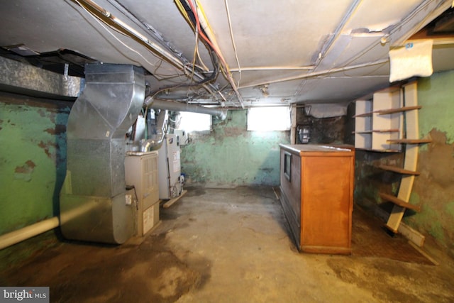 basement featuring gas water heater