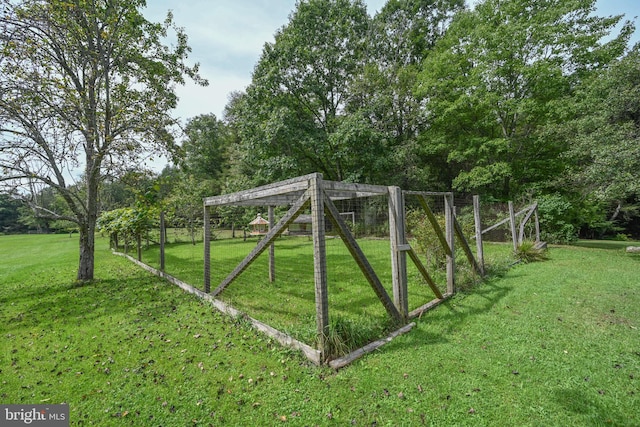 view of playground with a yard