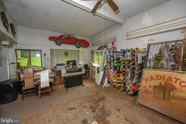 miscellaneous room featuring ceiling fan and concrete flooring