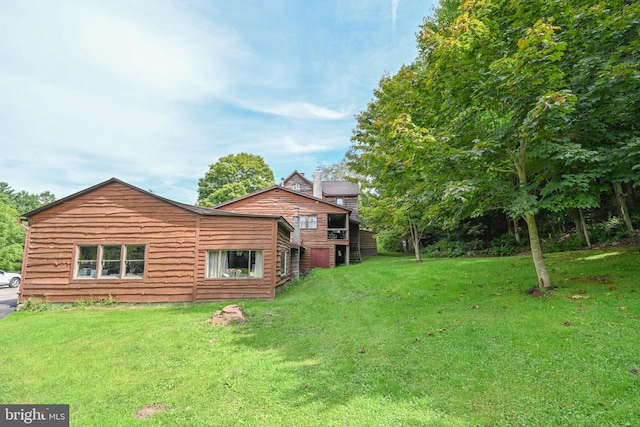 exterior space featuring a lawn