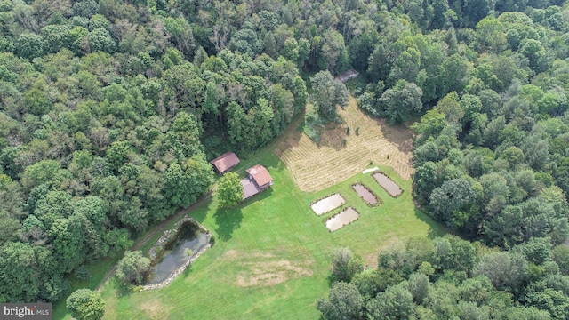 birds eye view of property with a rural view