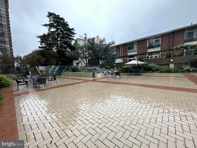 view of home's community with a patio
