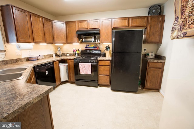 kitchen featuring sink and black appliances