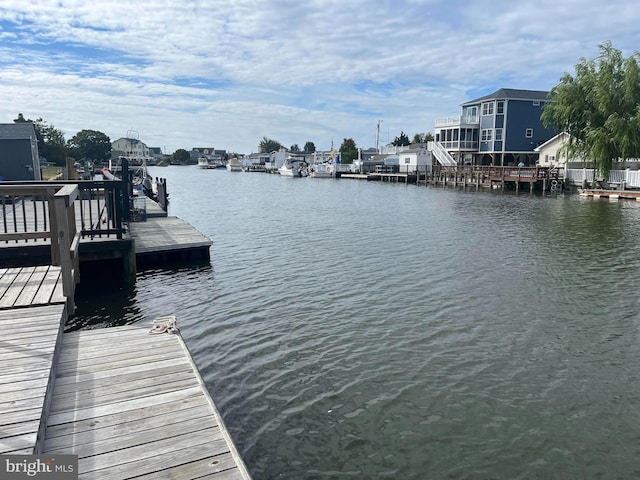 view of dock with a water view